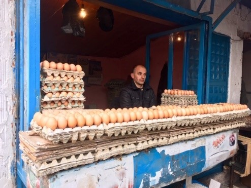 A man selling eggs in Kosovo